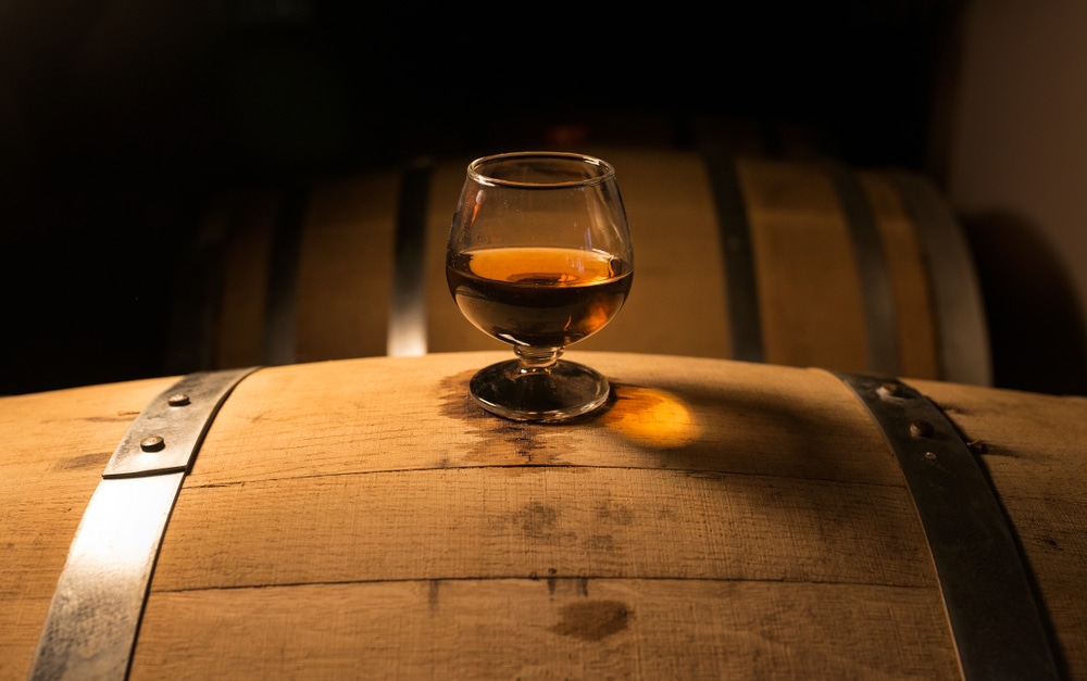 Bardstown Distilleries, tasting glass on a bourbon barrel